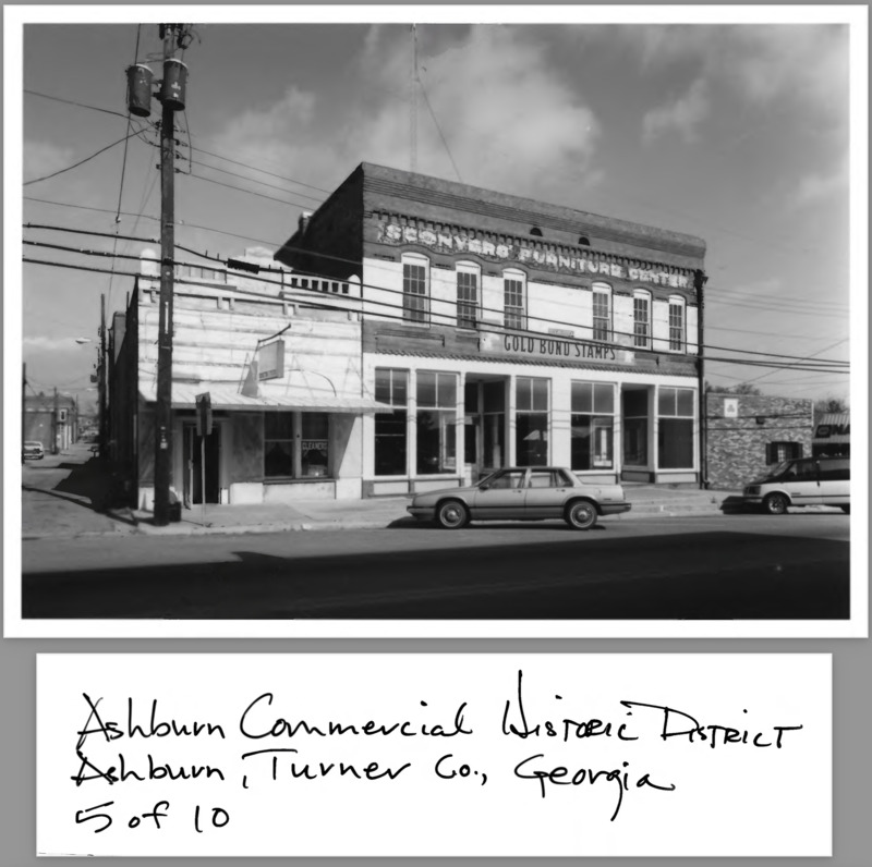 Ashburn Com. Hist. District Application Photo - 5 of 10 - Washington Ave. streetscape, former Ashburn Bank and Sconyers Furniture Center; photographer facing northeast.png