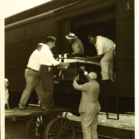 Return of Roy Sumner's body, casket from train removal, October 1942, front.jpg