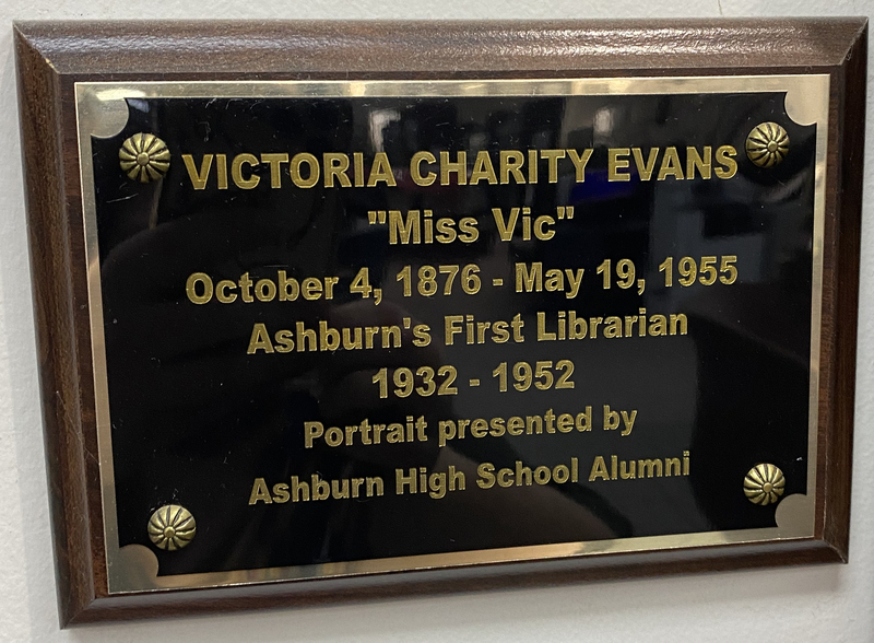 PLaque next to Victoria Evans portrait .jpg